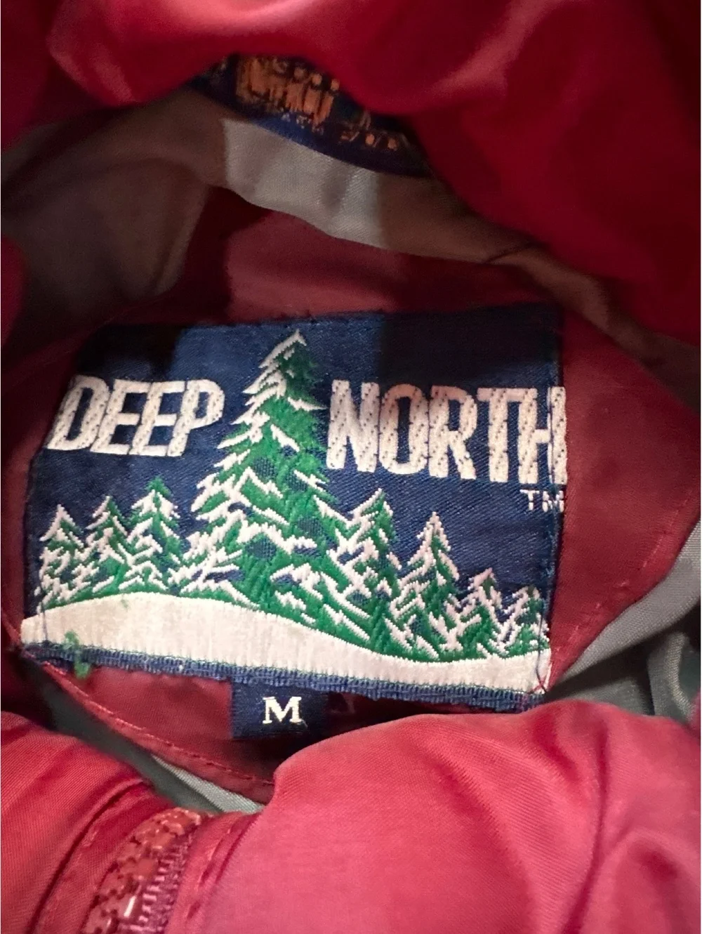 Red Quilted Puffer Jacket with Multiple Pockets and Zip Closure